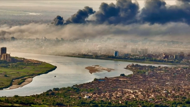 This video grab taken from AFPTV video footage, on Wednesday, shows an aerial view of black smoke covering the sky above the capital Khartoum (AFP photo)