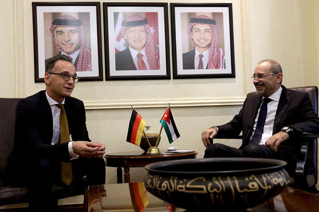 Foreign Minister Ayman Safadi meets with his German counterpart Heiko Maas in Amman on Sunday (AFP photo)