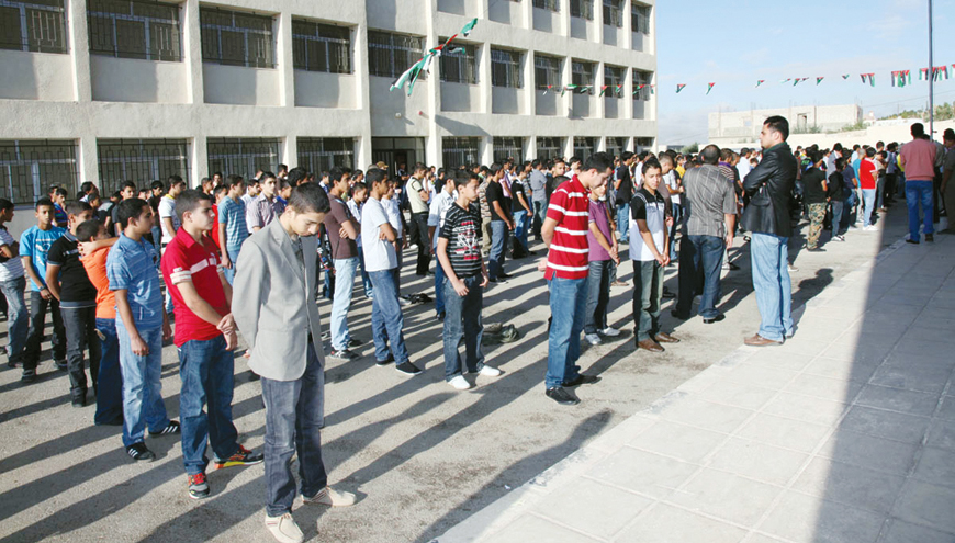Teachers supervise the morning assembly at a school in Amman recently. There are more than 40,000 private-school teachers in Jordan, according to the Social Security Corporation (Petra file photo)