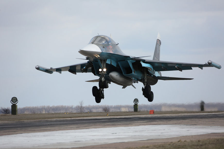 In this photo provided by the Russian Defence Ministry Press Service, Russian Su-34 bomber lands after returning from Syria at an air base near the Russian city of Voronezh on Tuesday (AP photo)