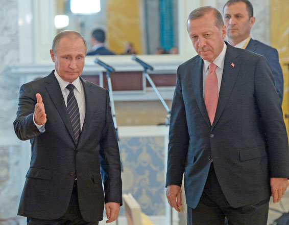 Russian President Vladimir Putin (left) and Turkish President Recep Tayyip Erdogan attend a news conference in the Konstantin palace outside St. Petersburg, Russia, on Tuesday  (AP photo)