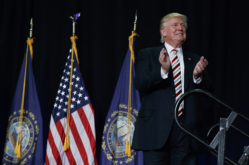 Republican presidential candidate Donald Trump arrives for a campaign rally at Windham High School, in Windham, N.H. on Saturday (AP photo)