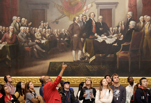 A guide leads visitors on a tour of the Capitol Rotunda during the opening day of the 115th Congress in Washington, US, on Tuesday (Reuters photo)