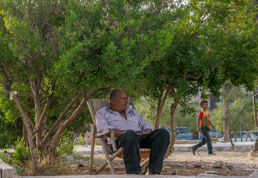 A man rests in the shade of a tree in Amman’s Nuzha area earlier this month. A rise in temperatures is forecast for the the rest of the week and the coming Eid Al Fitr holiday (Photo by Amjad Ghsoun)