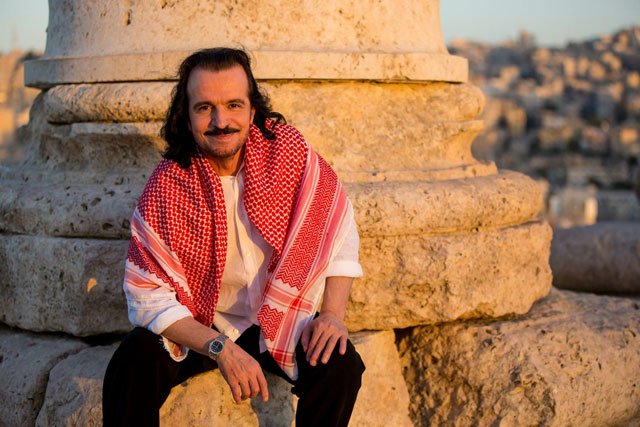 Yanni wears the traditional shmagh (headdress) in this photo taken last September, when the Greek composer performed in Amman’s Citadel (Photo courtesy of Yanni Facebook page/Krystalán)