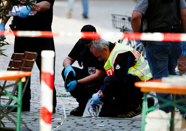 Police secure the area after an explosion in Ansbach, Germany, on Monday (Reuters photo)