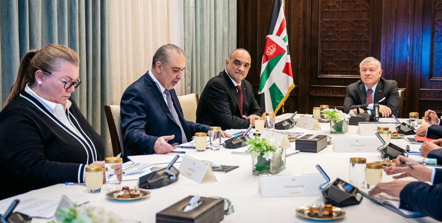His Majesty King Abdullah is briefed on the government’s priorities to implement public sector modernisation during a meeting at Basman Palace on Sunday (Photo courtesy of Royal Court)