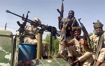 In this image grab taken from handout video footage released by the Sudanese paramilitary Rapid Support Forces on Tuesday, fighters ride in the back of a technical vehicle (pickup truck mounted with a turret) in the East Nile district of greater Khartoum (AFP photo)