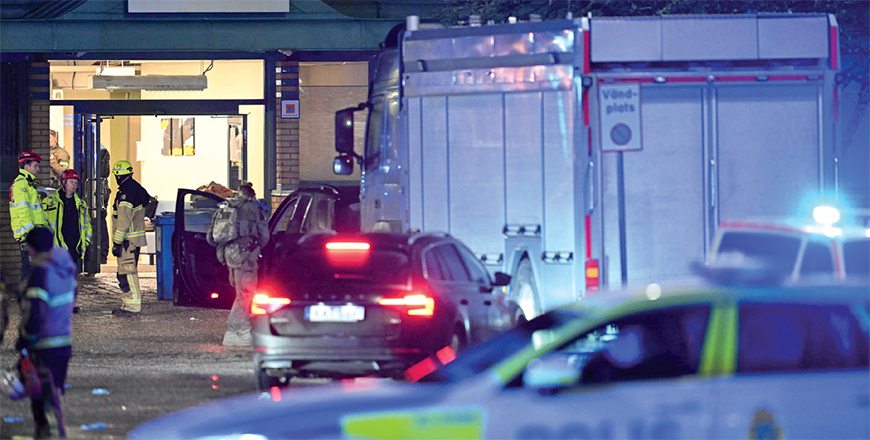 Members of the emergengy services work at the scene of the Risbergska School in Orebro, Sweden, on Tuesday, following reports of a serious violent crime (AFP photo)