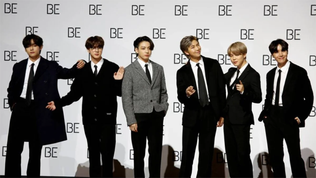 Members of K-pop boy band BTS pose for photographs during a news conference promoting their new album ‘BE(Deluxe Edition)’ in Seoul, South Korea (AFP photo)