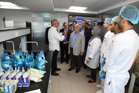 HRH Prince Hassan visits a factory in eastern Amman industrial zone on Monday (Petra photo)