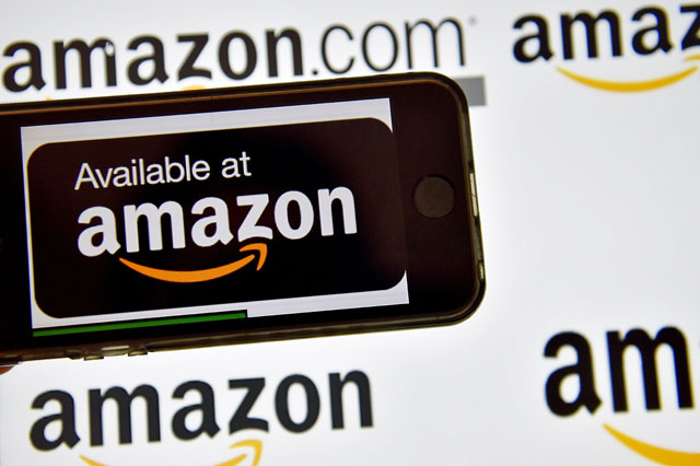 This file photo taken on December 28, 2016, shows the logo of US electronic commerce and cloud computing company Amazon in Vertou, France (AFP photo)