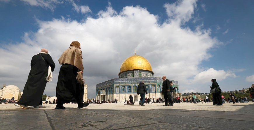 Palestinian worshippers gather at the Al Aqsa mosque compound for the Friday prayer in Jerusalem on February 24 (AFP photo)