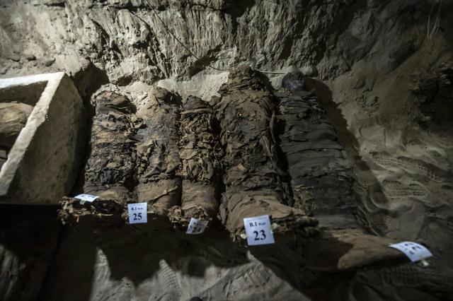 A photo taken on Saturday shows mummies lying in catacombs following their discovery in the Touna El Gabal district of the Minya province in central Egypt (AFP photo)