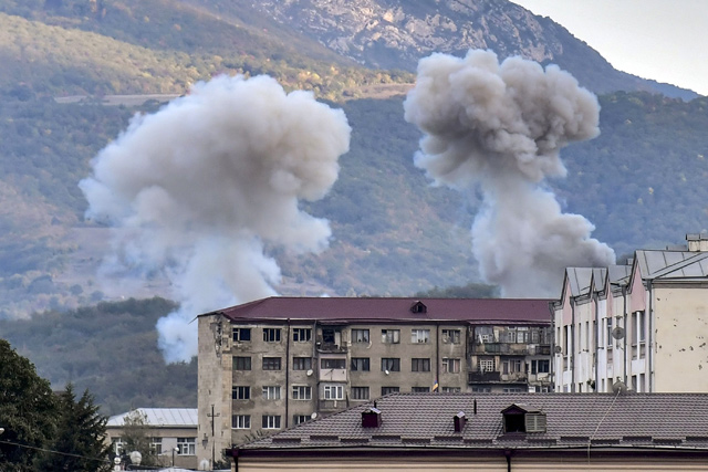 Smoke rises after shelling in Stepanakert on Friday, during ongoing fighting between Armenia and Azerbaijan over the disputed region of Nagorno-Karabakh (AFP photo)