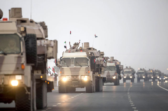 In this handout file photo made available on November 7, 2015, by the United Arab Emirates News Agency, a UAE military convoy travels from Al Hamra military base to Zayed city after returning from Yemen (AFP photo)