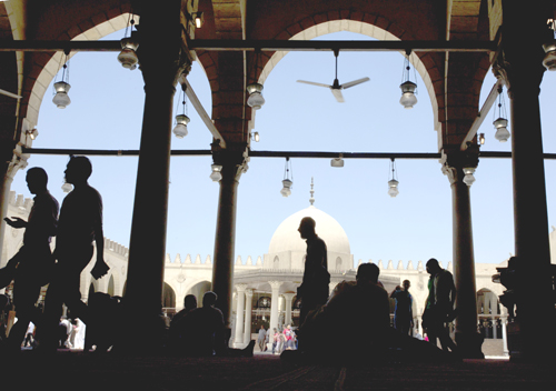Egyptian worshippers leave Friday prayers at Amr Ibn Al As Mosque in Cairo, Egypt, on Friday. The government is promoting the standardised sermons as part of its efforts to reform the religious discourse and curbing extremism (AP photo)