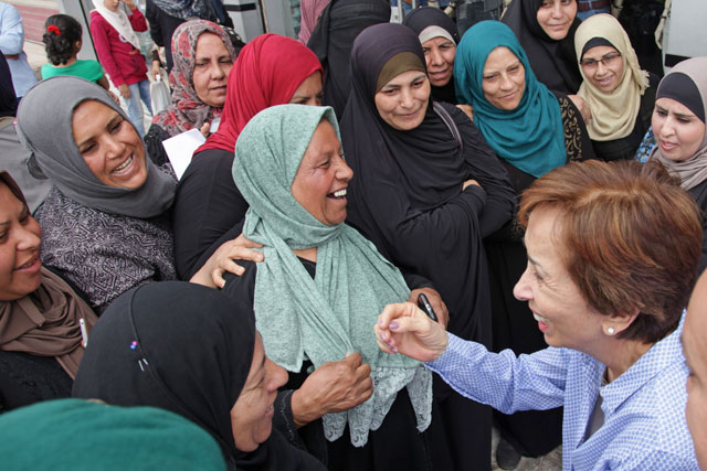 Princess Basma takes part in the Goodwill Campaign's distributions in Hittin camp in Zarqa on Tuesday (Photo courtesy of JOHUD)