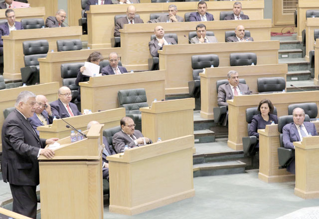 Finance Minister Omar Malhas addresses the Lower House on Sunday (Petra photo)
