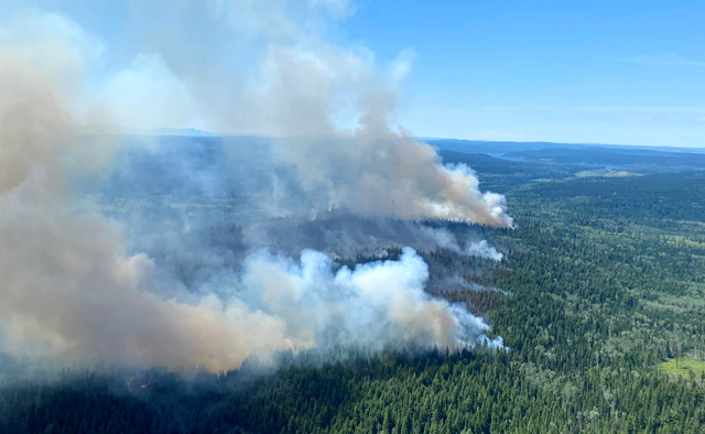 This handout photo courtesy of BC Wildfire Service shows a wildfire southwest of Deka Lake (C41102), which is estimated to be 200 hectares, British Columbia, on Friday (AFP photo)