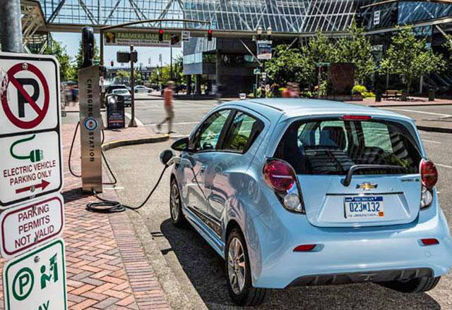 Over 10,000 smart electric vehicle charging stations will be installed in the Kingdom under the new agreement (File photo)