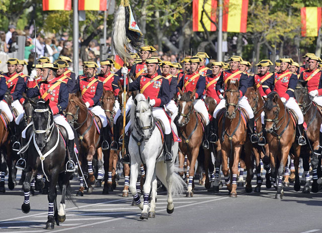 Spanish Guardia Civil honour troops march during the Spanish National Day military parade in Madrid on Thursday (AFP photo)