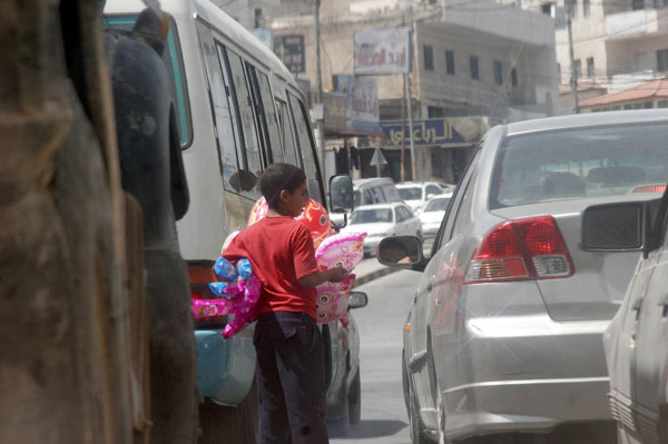 Most child workers are employed in the wholesale and retail trades, as well as the agriculture, forestry and fishing industries, and on average they work over 33 hours a week, according to a report released on Tuesday (Petra file photo)