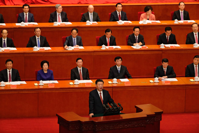China's President Xi Jinping speaks during a ceremony to commemorate the 90th anniversary of the founding of the People's Liberation Army at the Great Hall of the People in Beijing on Tuesday (AFP photo)