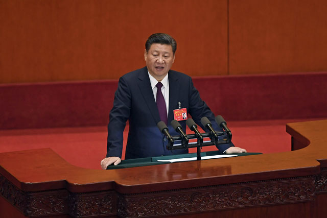 Chinese President Xi Jinping delivers a speech at the opening session of the Chinese Communist Party's Congress at the Great Hall of the People in Beijing on Wednesday (AFP photo)