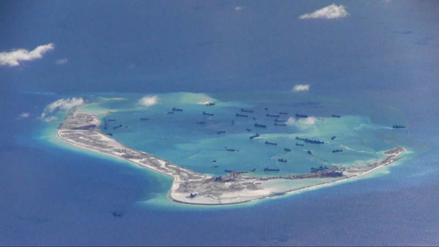 Chinese dredging vessels are purportedly seen in the waters around Mischief Reef in the disputed Spratly Islands in the South China Sea in this still image from video taken by a P-8A Poseidon surveillance aircraft provided by the United States navy on May 21, 2015 (Reuters photo)