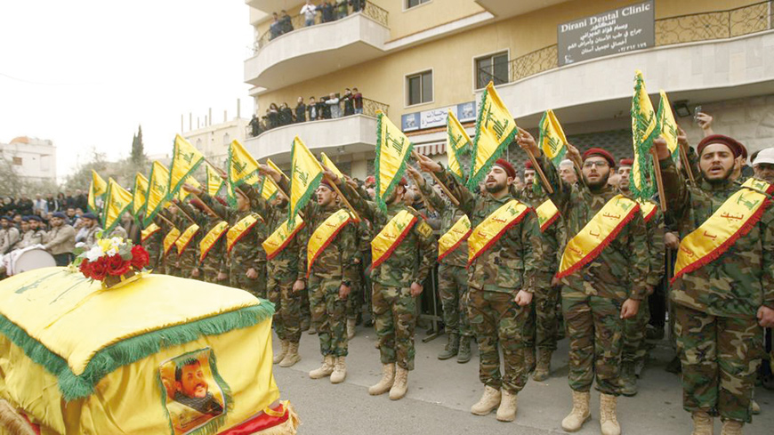 Hizbollah fighters attend the funeral of a comrade who died in combat in Syria, on March 18, 2017 (AFP photo)