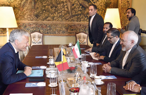 Belgium's Deputy Prime Minister and Foreign Minister Didier Reynders (left) attends a meeting with Iran Minister of Foreign Affairs Mohammad Javad Zarif (right) at the Egmont Palace in Brussels on Tuesday (AFP photo)