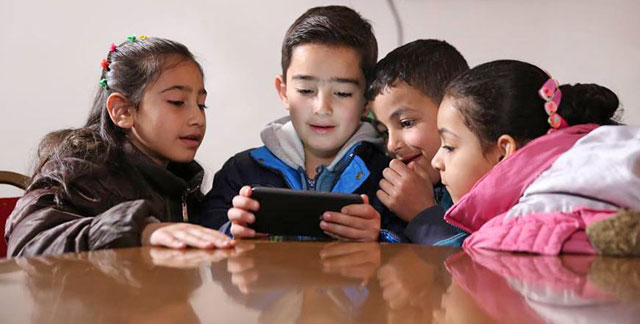 The pilot run by QRF aims to explore the potential use of mobile learning to support basic literacy and numeracy in Syrian refugee camps and Jordanian host communities (File photo)