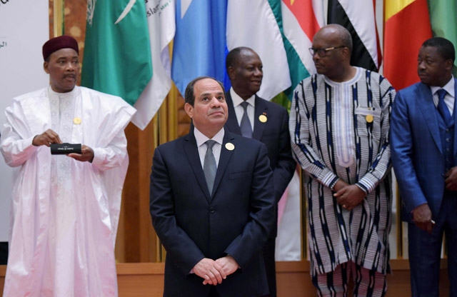 Egyptian President Abdel Fattah Al Sisi poses for a group photo during the Arab-Islamic American summit at the King Abdulaziz Conference Centre in Riyadh, on Sunday (AFP photo)