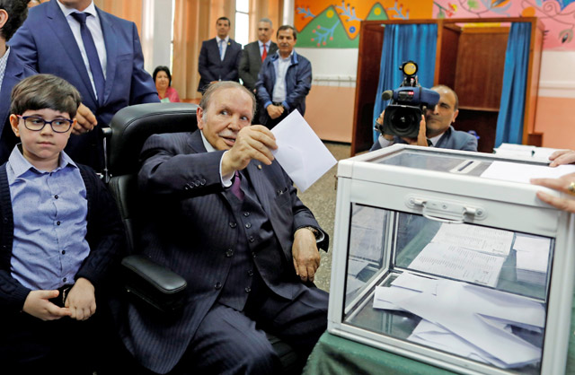 Algeria's President Abdelaziz Bouteflika casts his ballot during the parliamentary election in Algiers, Algeria, on Thursday (Reuters photo)