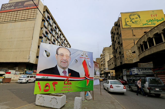 A campaign poster of former Iraqi prime minister Nuri Al Maliki is seen in the street ahead of the parliamentary election in Baghdad, Iraq, on Tuesday (Reuters photo)