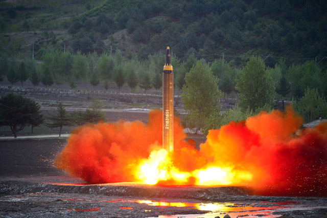 The long-range strategic ballistic rocket Hwasong-12  is launched during a test in this undated photo released by North Korea's Korean Central News Agency on Monday (Reuters photo)