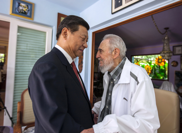 In this July 22, 2014 file photo, Cuba’s former president Fidel Castro (right) greets China’s President Xi Jinping in Havana, Cuba (AP photo)