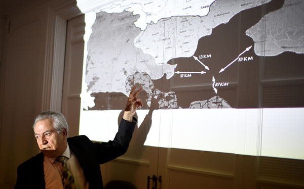 Kurdish-Syrian representative in France Khaled Issa shows a map of alleged attacks against Kurdish forces as he accuses Turkey of ‘massively attacking’ Kurdish forces trying to recapture Raqqa, during a press conference in Paris, on Tuesday (AFP photo)