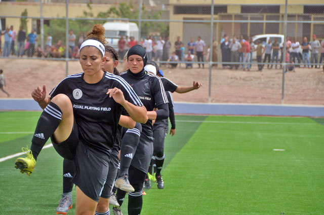 Women football players take part in a friendly game at the new pitch in Ghor Safi in April 2018 (Photos by Muath Freij)