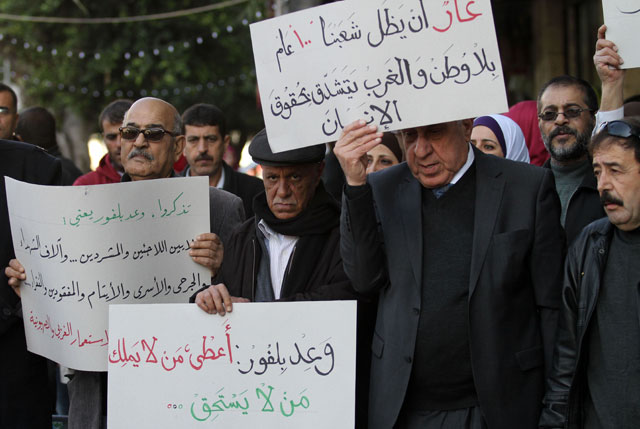 Palestinians take part in a protest in Nablus to mark the 100th anniversary of the Balfour Declaration on Tuesday (Anadolu Agency photo)