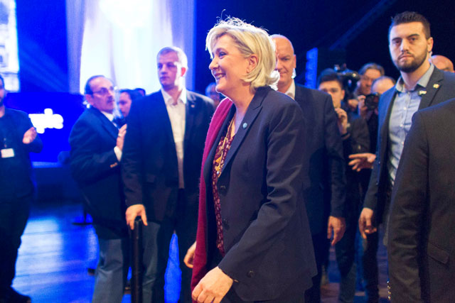 Marine Le Pen, French National Front (FN) political party leader and candidate for French 2017 presidential election, arrives to attend the 2-day FN political rally to launch the presidential campaign in Lyon, France, on Saturday (Reuters photo)
