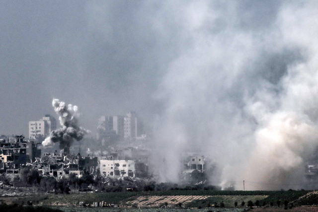 A picture taken from near the southern Israeli city of Sderot on October 28, 2023, shows smoke raising during an Israeli strike in the northern Gaza Strip (AFP photo)