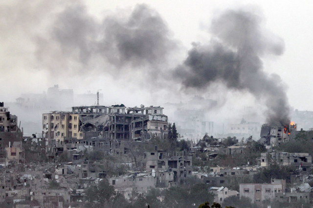 A photo taken from Israel's southern city of Sderot shows smoke rising following Israeli bombardment in the north of the Gaza Strip, on Wednesday (AFP photo)