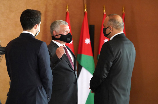 His Majesty King Abdullah, accompanied by HRH Crown Prince Hussein, meets with Prime Minister Bisher Al Khasawneh at Al Husseiniya Palace on Monday (Photo courtesy of Royal Court)
