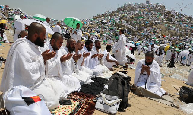 Muslim pilgrims pray at Mount Arafat, also known as Jabal Al Rahma (Mount of Mercy), southeast of the Saudi holy city of Mecca, as the climax of the Hajj pilgrimage approaches  on Monday (AFP photo)