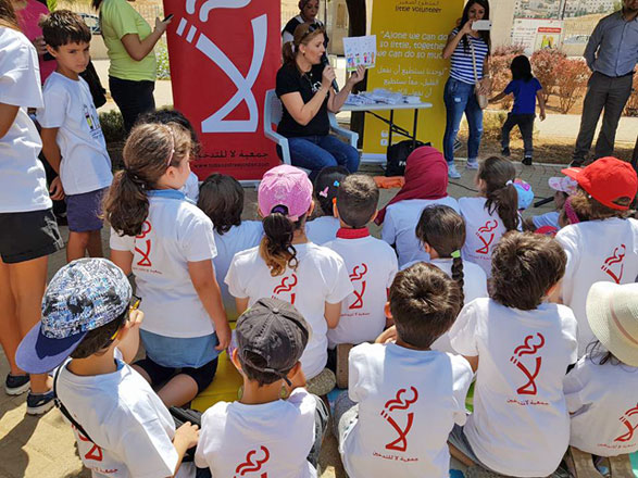 In this undated photo, Larissa Al Wer, of Tobacco-Free Jordan, can be seen speaking to children during an event on the dangers of smoking (Photo courtesy of Zeina Shahzada)
