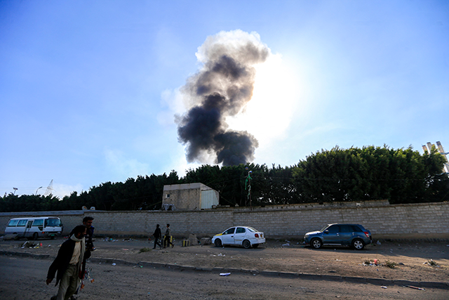 Smoke billows from the site of an Israeli airstrike that targeted a power station in the Huthi-run Yemeni capital Sanaa on December 19, 2024 (AFP photo)