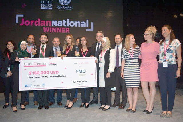The four members of 'Here for Heat' pose for a group photo after being awarded the $150,000 prize at the King Hussein Business Park on Saturday (Photo courtesy of Here for Heat)