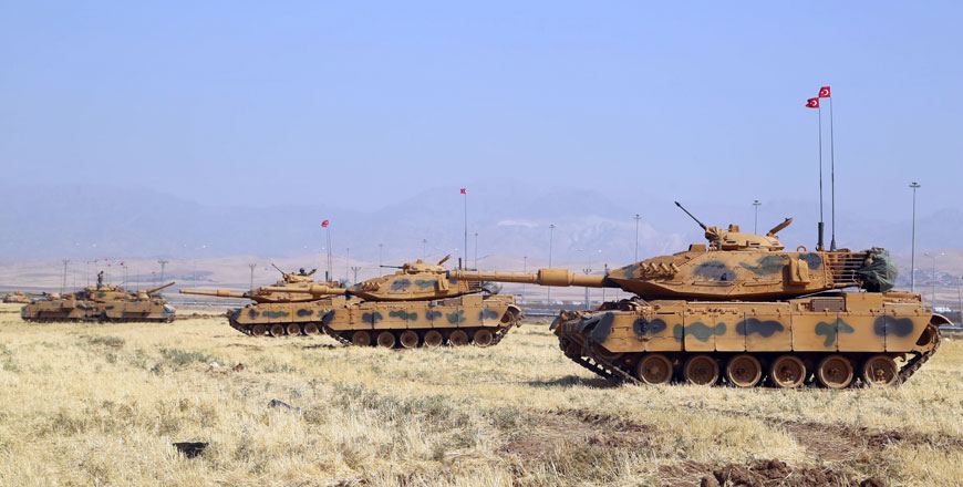 Turkish tanks are seen near the Habur crossing gate between Turkey and Iraq during a military drill on Monday (AFP photo)